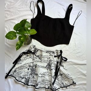 Vintage White skirt with black writing and lace